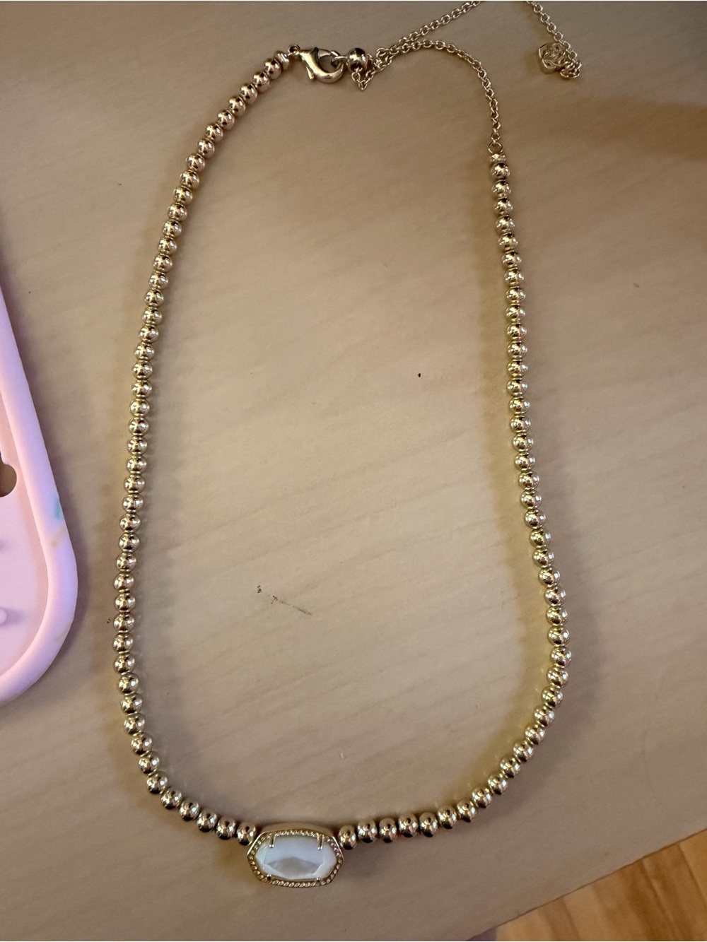 Kendra Scott gold beaded necklace… mother stone. Never used